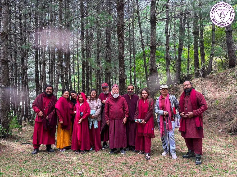 The whole retreat group together among the pines on a forest walk